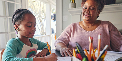 Mother and child doing homework